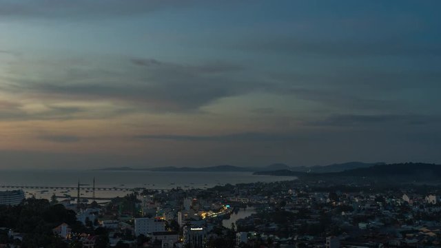 View from the high on evening Duong Dong Town and on coastline. Timelapse video. 