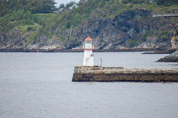 Fototapeta na wymiar Small lighthouse in Trondelag county in Norway.