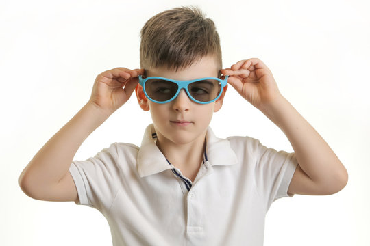 Cute teenage boy with sunglasses — Stock Photo © StarsStudio #33364233