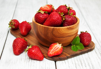 ripe strawberries on wooden table
