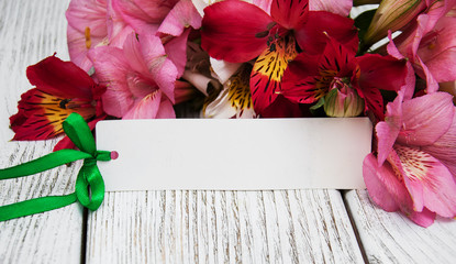 Naklejka na ściany i meble paper card with alstroemeria flowers