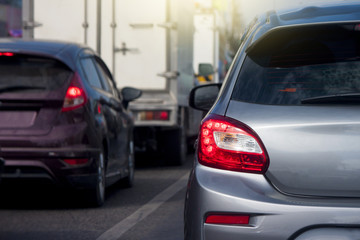 Cars on the road heading towards the goal of the trip.and stop on highway by traffic jam in city. 