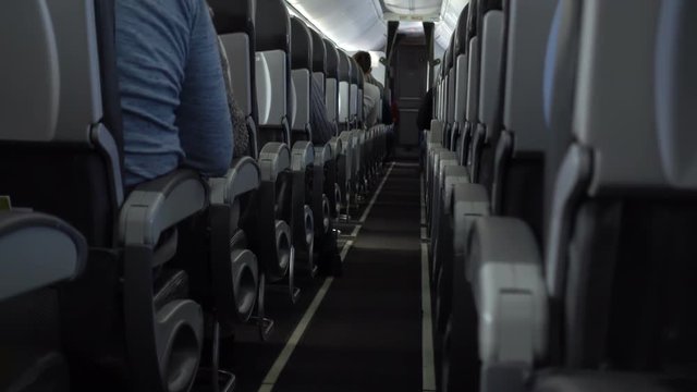 Passengers in comfortable seats of aircraft