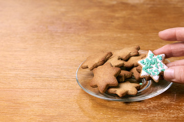 Ginger biscuit decoration. White glaze. Brown background