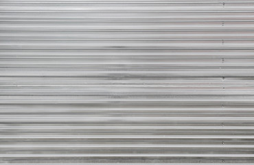 Old metal door. Abstract metall background. Sheet metal fence