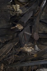 Old Boiler room in dirty old basement of warehouse building with rust and trash