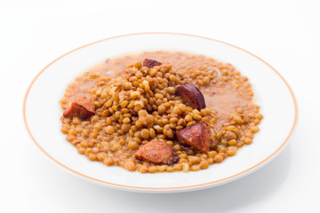 dish of lentils cooked at home isolated on white