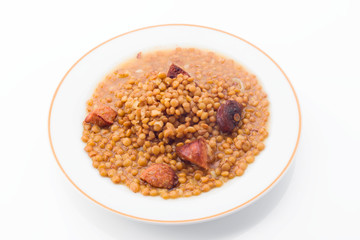 dish of lentils cooked at home isolated on white