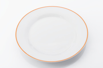 white ceramic dish on white background