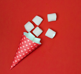 RMarshmallow rashes of a red horn on a red background