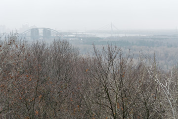Dnieper river and bridge in fog, Ukraine.
