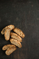 Classic Italian cookies. Biscotti cantuccini. Copy space. Black background.