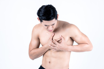 Fototapeta na wymiar Fitness and health concept. Fit sport man having heart attack, isolated on white background in studio. Half naked Asian chinese lean muscular male wearing a black shorts.