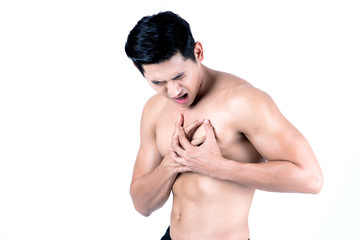 Obraz premium Fitness and health concept. Fit sport man having heart attack, isolated on white background in studio. Half naked Asian chinese lean muscular male wearing a black shorts.