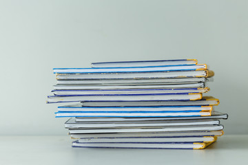 Many old books in a pile