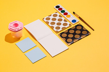 The many notebooks on colored table. memo and planning concept.