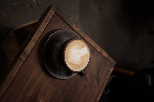 Cappuccino on wooden table