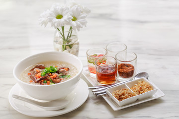 Boiled rice with pork and garnish tool