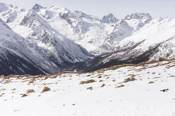 Mountain winter landscape with white peaks.