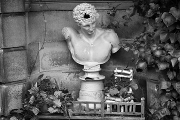 Weathered and lost place on an graveyard in Berlin