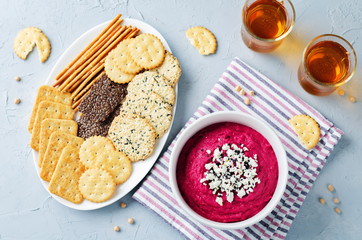 Beet hummus with Feta and black sesame