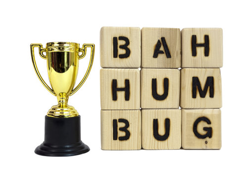 Award trophy with sour grapes sentiment. Bah Humbug!