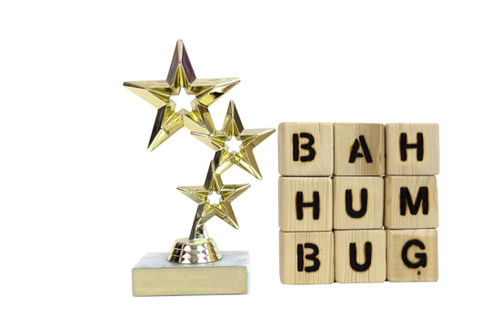 Three star award trophy with sour grapes sentiment. Bah Humbug!