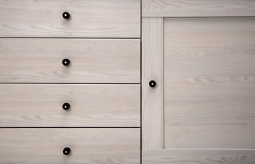 Beautiful wardrobe with drawers, closeup