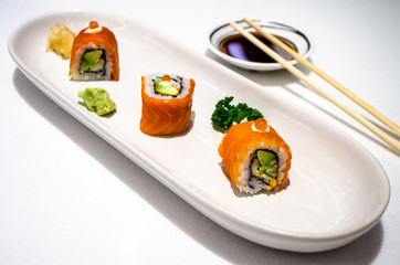 Rolls with salmon and avocados
