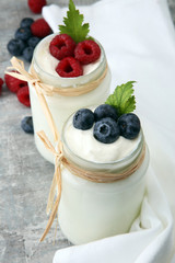 Fresh Yogurt. Breakfast with yogurt and blueberries and raspberrries