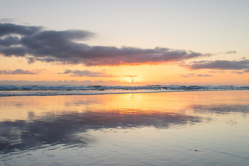 Fototapeta na wymiar Early morning sunrise at the beach on Queensland's Gold Coast in Australia
