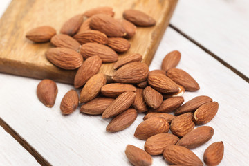 Almonds on a wooden background