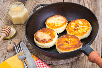 Four ruddy cottage cheese cakes