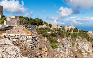 View of the Church of St. John the Baptis and Hormanno Castle and Torri del Balio Castle in Erice,...