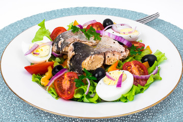 Tasty vegetable salad with canned fish