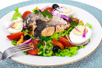 Tasty vegetable salad with canned fish