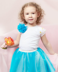 Little girl with a bouquet of flowers