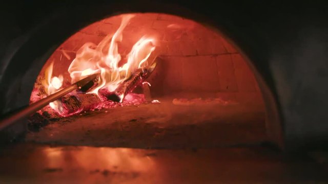Pizza in the wood oven