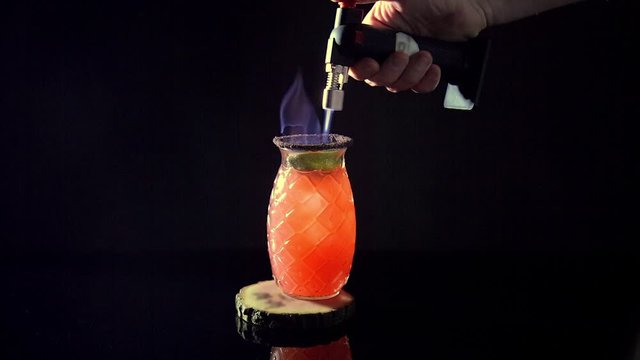 Preparation of alcoholic cocktail. Studio shooting. Looping Motion Photo