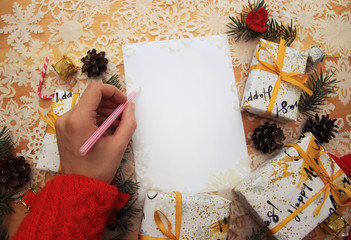 man writing something on white sheet / template
