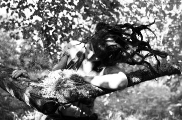 Dryad guarding a bird's nest in the old garden
