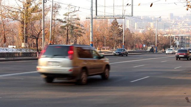 Time lapse of city traffic cars on the roads