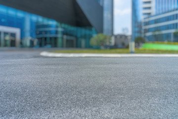 empty urban road with modern building in the city.