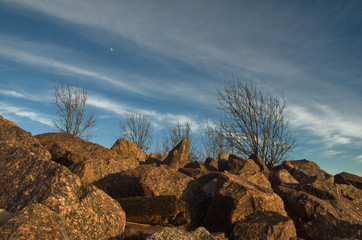 Obraz premium clouds over granite quarry
