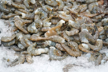 Fresh raw shrimp frozen on the ice