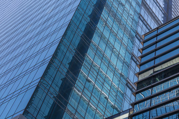 Obraz na płótnie Canvas detail shot of modern business buildings in city
