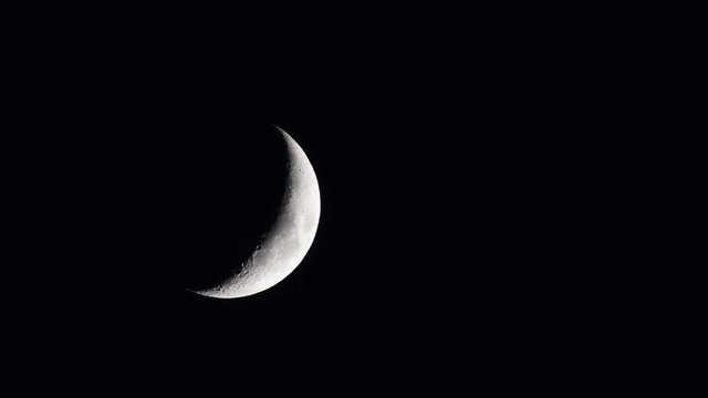 time lapse of crescent moon