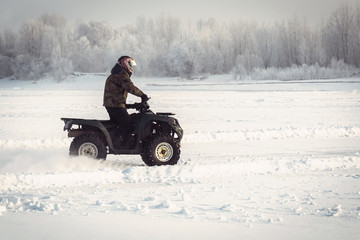 Winter fun on the ATV. © diy13