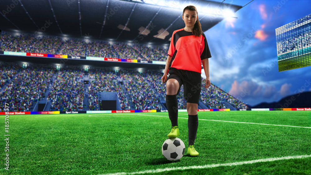 Wall mural female football player in red uniform on soccer field