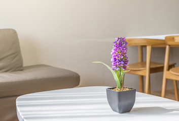 Artificial Flowers or Arpophyllum in small pot